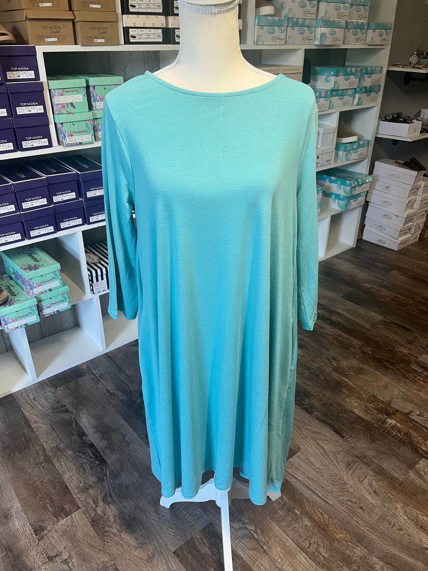 Teal swing dress with pockets